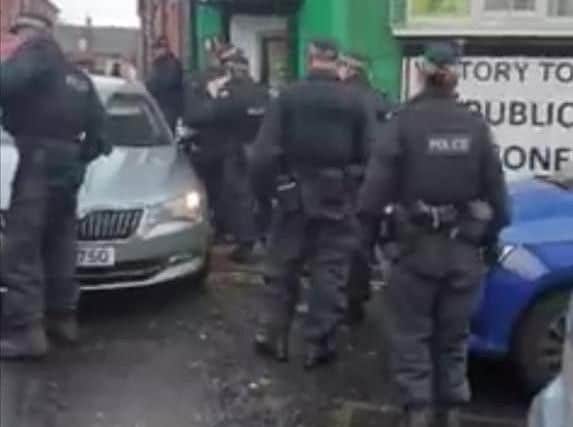 The PSNI at Junior McDaid House on Thursday.