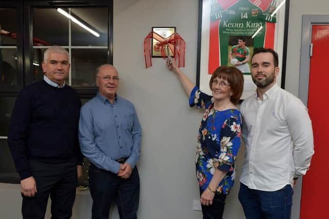 Margaret King, mother of the late Kevin King, officially opens the KK Fitness Suite at Slaughtmanus GAC on Friday evening last. Included in the photograph are Kevin Watson, Club Chairman, Kevins dad John and his brother Martin. DER4519GS - 037