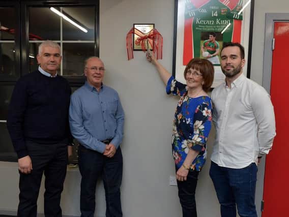 Margaret King, mother of the late Kevin King, officially opens the KK Fitness Suite at Slaughtmanus GAC on Friday evening last. Included in the photograph are Kevin Watson, Club Chairman, Kevins dad John and his brother Martin. DER4519GS - 037