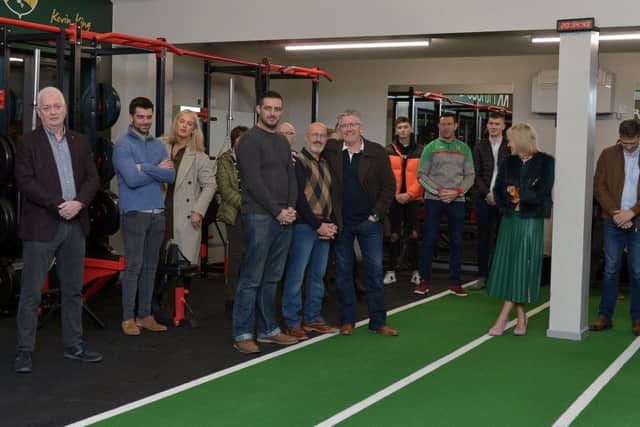 Friends and club mates of the late Kevin King attend the blessing and official opening of the KK Fitness Suite at Slaughtmanus GAC on Friday evening last. DER4519GS - 040