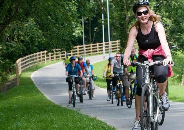 Some of the cyclists who travelled along the new Urban Greenway in St. Columb's Park after it was offically opened at teh weekend. Picture Martin McKeown. Inpresspics.com. 2.6.12