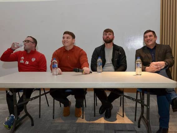 Derry City manager, Declan Devine, assistant boss, Kevin Deery and first team and Academy coach, Paddy McCourt alongside women's coach Kevin Tyre address the attendance at Monday night's Derry City FC Review of the Season event in Magee University.