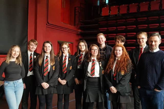 Limavady High Schools GCSE and A level drama students pictured with director Kieran Griffiths and actor Daniel McCafferty on their recent visit to The Playhouse.