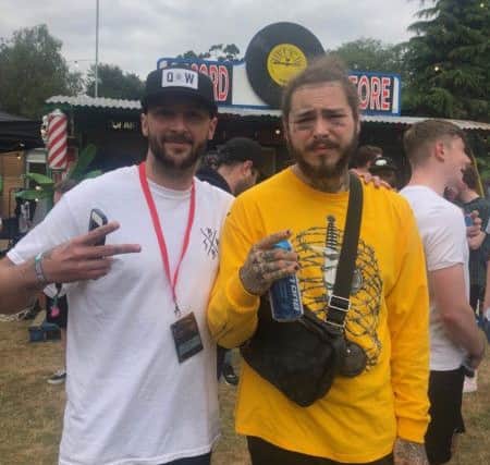 Local barber Gregg McNeill and American rapper, singer, songwriter, and record producer Post Malone