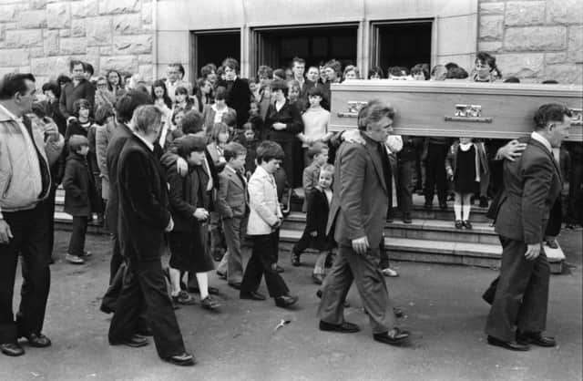 May 1981... Harry Duffys children follow his coffin as it makes its way to the City Cemetery following Requiem Mass at St Marys Church, Creggan. INSET: Harry Duffy.