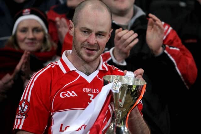 Kevin McCloy in 2011 holding the McKenna Cup