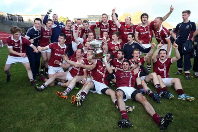 The victorious Slaughtneil's team celebrate.( Photo Lorcan Doherty / Presseye.com)