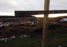 The cross left at the scene..