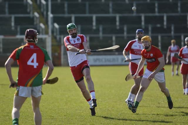 Michael Conway fires over a point for Derry during Sunday's match against Carlow. DER1015-143KM