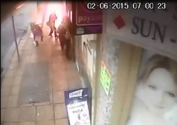 The moment the manhole cover exploded