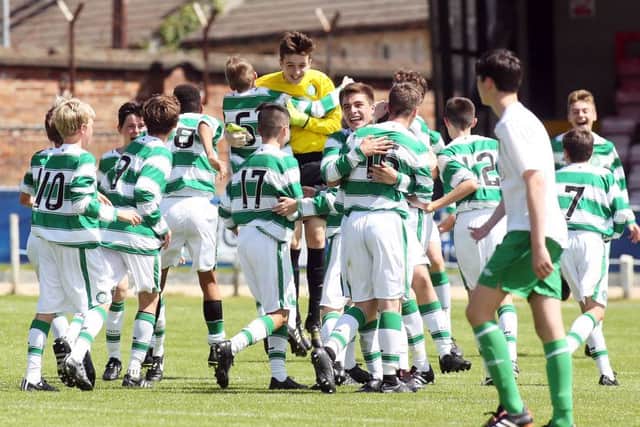 .

Celtic players celebrate at the final whistle.


Photo Lorcan Doherty Photography