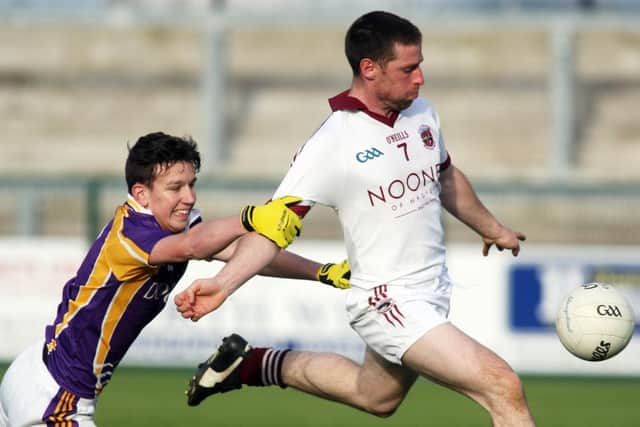 Slaughtneil's Barry McGuigan gets away from Derrygonnelly's Shane McGullion during Sunday Ulster Club Championship clash. ( Photo Lorcan Doherty / Presseye.com)