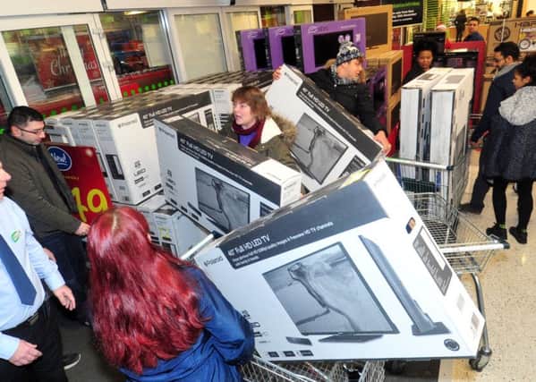 Shoppers grab bargain TV's on offer on Black Friday