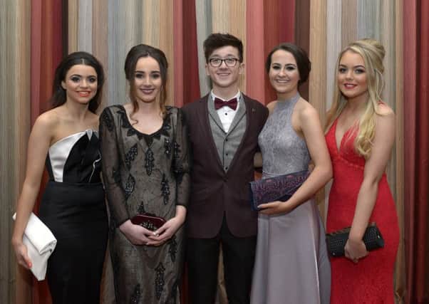 Caoimhe Murphy (on the left), Emer McLaughlin, Cormac Porter, Rachel McGonagle and Kerri McLaughlin at the Scoil Mhuire Formal in the Inishowen Gateway Hotel, Buncrana.  DER0116GS010