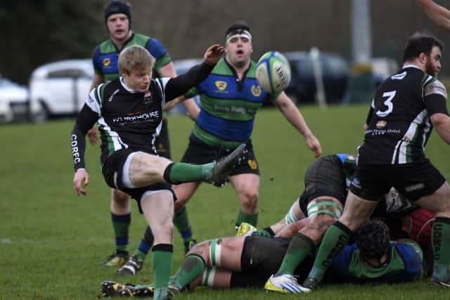 Andrew Semple clears his lines for City of Derry during Saturday's match against Seapoint. INLS0216-105KM