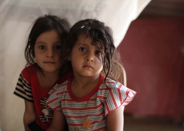 Children like Aisha, 6, and Sara, 4 (above) are likely to be amongst the group of Syrian refugees who will arrive in Derry later this year.