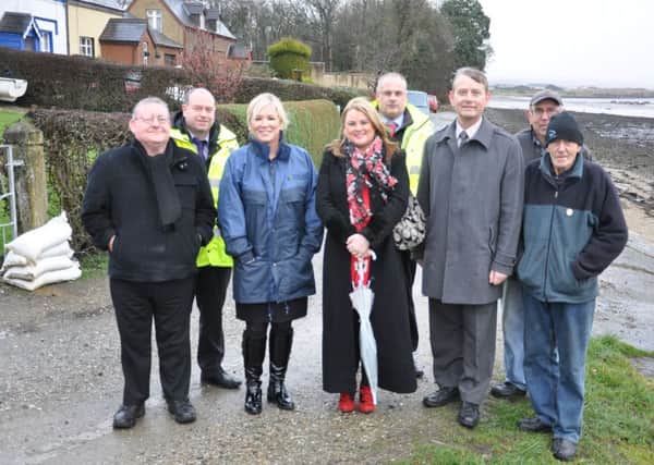 Agriculture Minister, Michelle O'Neill pictured during a recent visit to Culmore Point to assess flooding damge. Included is, from left, Colr. Tony Hassan, Michelle O'Neill MLA, Colr. Sandra Duffy and Alderman Maurice Devenney.