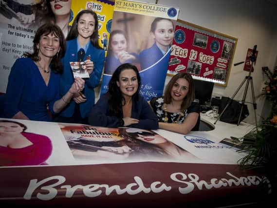 Celebrity stylist, beauty expert and former student Brenda Shankey, pictured at St. Mary's College on Monday afternoon for the launch of her new audiobook 'Be Fabulous - Have It All'. Included are Mrs. Marie Lindsay, Principal, St. Mary's College, Kennedy Keeney-Robinson, Head Girl and Mayor of Derry City and Strabane District Council, Councillor Elisha McCallion. DER0216MC010