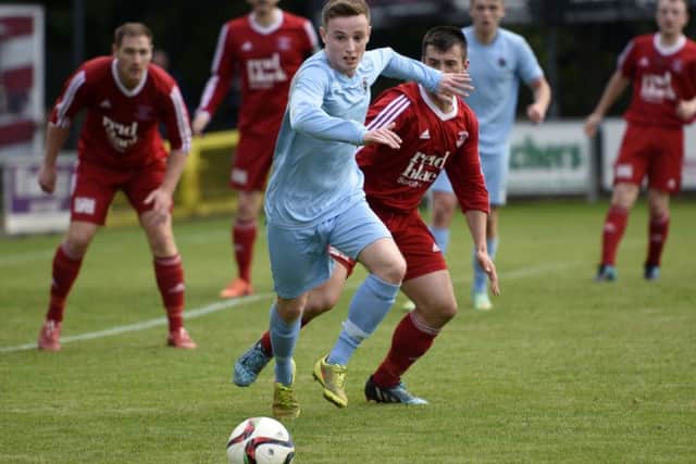 Institutes Aaron Harkin rattled the bar in the first half against Bangor.