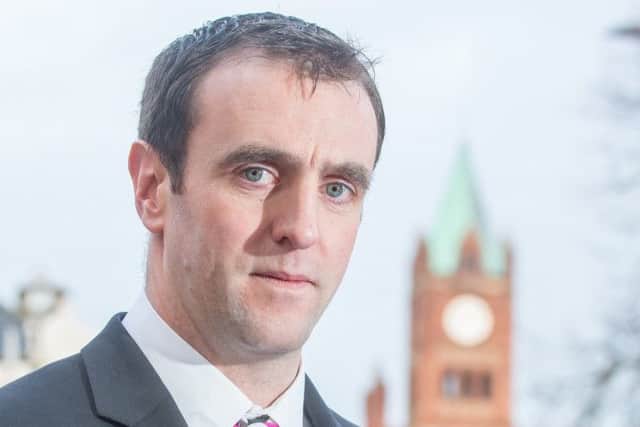 Environment Minister Mark H. Durkan. 18.12.68