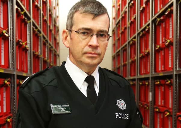 Deputy Chief Constable Drew Harris in a Carrickfergus storage vault, one of eight secure location where historic murder files are kept