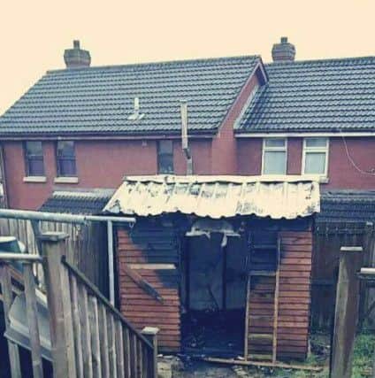The burnt out shed