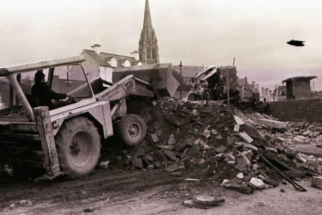 A bulldozer removes a barricade from the Bogside in the aftermath of Operation Motorman.