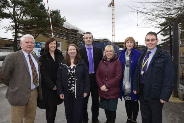 Pictured at the site of the new Radiotherapy Centre at Altnagelvin Hospital were, from left, Alan Moore, Director of Strategic Capital Development, WH&SCT, Deborah Kerr, Lead Pre-Treatment Radiographer, Elaine Reilly, Lead Treatment Radiographer, Dr David Stewart, Consultant Oncologist, Una Cardin, Radiotherapy Unit Manager, Margaret McIvor, Radiotherapy Project Lead, and Andrew Reilly, Head of Radiotherapy Physics. INLS0316-154KM