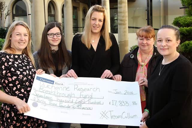 Laura Smith (right) with Pat Smith, Hayley Marshall, and Caitlin Smith present a cheque for Â£17833.88 on behalf of team Callum to Cathryn Gibson of the charity Muscular Dystrophy. INLV0416-003KDR