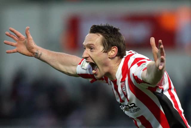 Barry Molloy celebrates scoring one his 12 strikes for his hometown club.