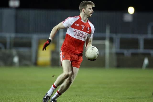 Christy's brother, Niall, in action for the Derry senior football team.