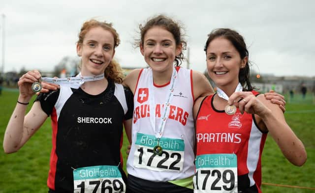 Winner of the Women's Intermediate 5000m race, Marie Hyland, centre, Crusaders AC, Dublin, with second placed Catherina Mullen, left, Shercock AC, Co.Cavan, and third placed Catherine Whoriskey, right, City of Derry AC Spartans at the GloHealth National Master, Intermediate, Juvenile B & Juvenile Inter County Relay, Dundalk.