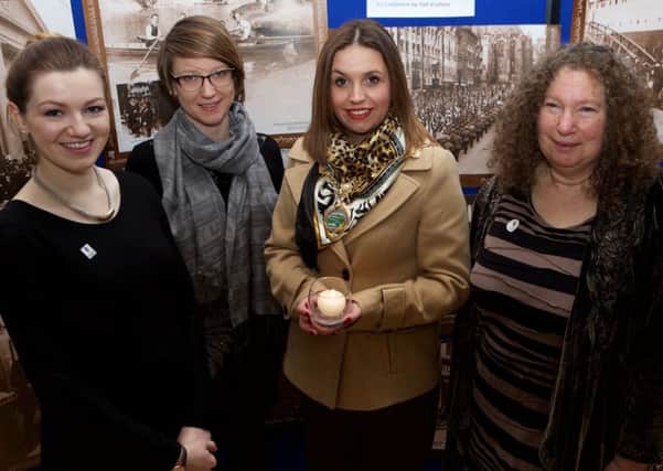 Mayor Elisha McCallion pictured at the ceremony of reflection to mark Holocaust Memorial Day held in the Guildhall, with, from left, event organiser Niamh Scullion, Derry City & Strabane District Council, Aggie Luczak, NICEM, and, on right, Philippa Robinson. (Photo - Tom Heaney, nwpresspics)