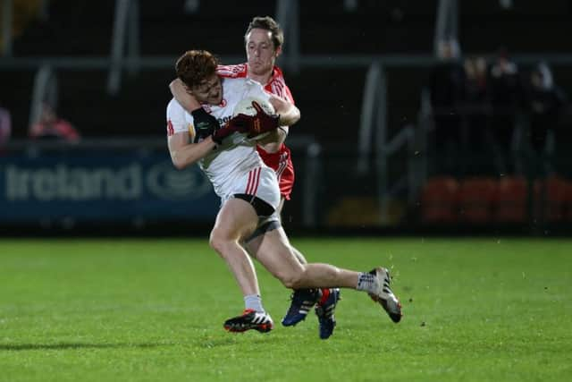 Derry's Neil Forester gets in a tackle on Tyrone's Conor Meyler in the Athletic Grounds, Armagh last week. (Picture by Andrew Paton/Presseye.com)