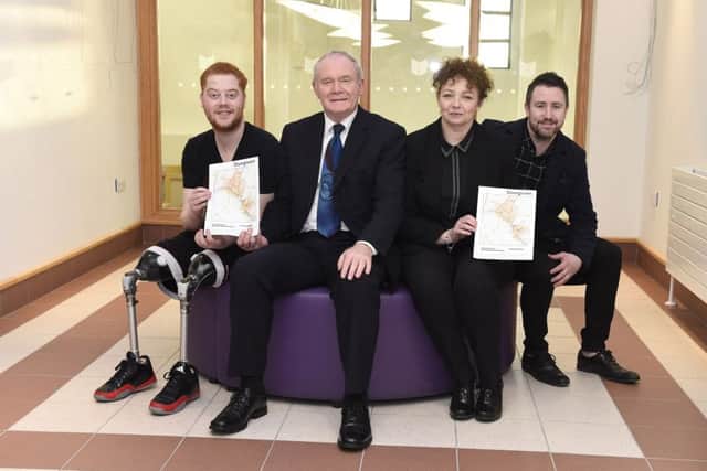 Sports Minister CarÃ¡l Ni Chuilin and deputy First Minister Martin McGuinness are disabled athlete Ryan O'Connor and Dungiven boxer Paul McCloskey. Picture: Michael Cooper