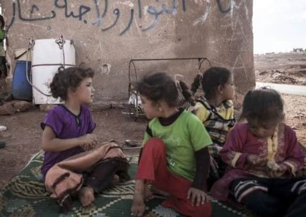 Children in the city of Madaya in Syria, who are starving.