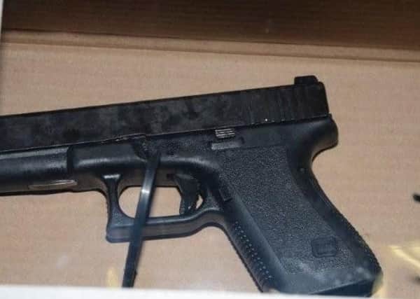 The Glock handgun recovered by police from a car at Derry City Cemetery on Wednesday.