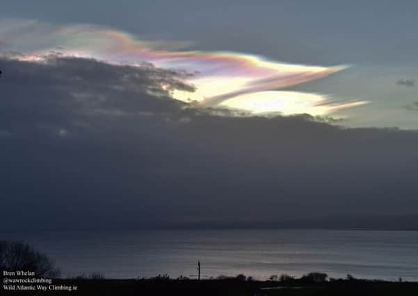 The rare polar / rainbow clouds known as Nacreous, captured by Bren Whelan over Lough Foyle