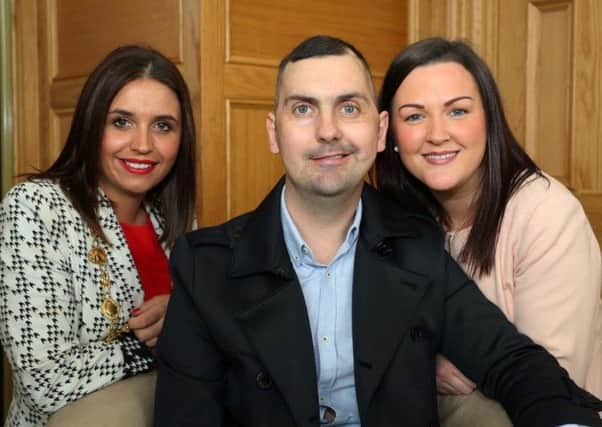 The late Mark Farren pictured with the Mayor and his wife Terri.