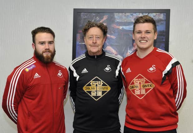 Roy Thomas (centre) Academy Head of Coaching at English Premier League side Swansea City with local soccer coaches Roy Kehoe and Conor Loughrey at the Brooke Park centre in Rosemount. DER0516GS008