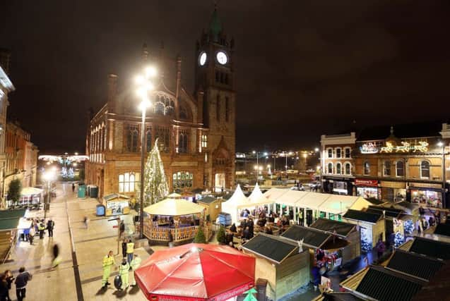 The Guildhall Square/ Waterloo place regeneration led to the temporary relocated of the Walled City Market. Since then the Walled City Market and the Christmas Market (pictured) have returned to Guildhall Square.