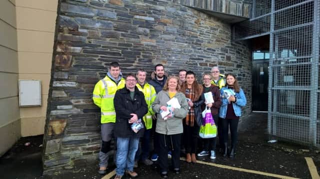 Sinn FÃ©in Councillor  Patricia Logue and James McIvor, DC&SDC join team members ,TRIAX distributing leaflets regarding dog fouling in the Brandywell & Dove Gardens area.