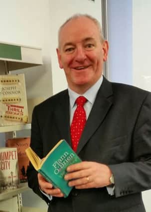 Foyle MP Mark Durkan supporting National Libraries Day.