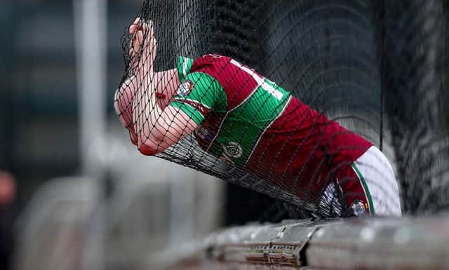 A distruaght 
Colm McGoldrick of Eoghan Rua after the end of Sunday's All Ireland Junior Hurling final in Croke Park. (INPHO/Donall Farmer)