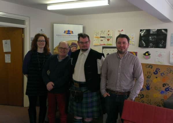 Pictured at Autism Initiatives' office in the Waterside are Margaret McLean, Floating Housing Support Worker, Frank Nelis, Bryan Sutherland and Dale Mitchell, Service Manager.