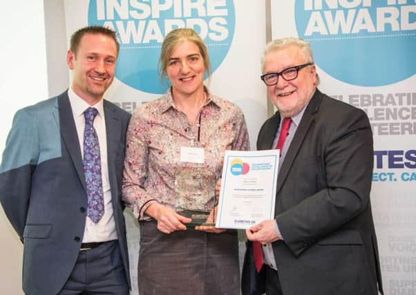 Diabetes UK Northern Ireland National Director Dr David Chaney and award winner Hilary Caskey receiving her award from Diabetes UK Northern Ireland Trustee Jim McCall.