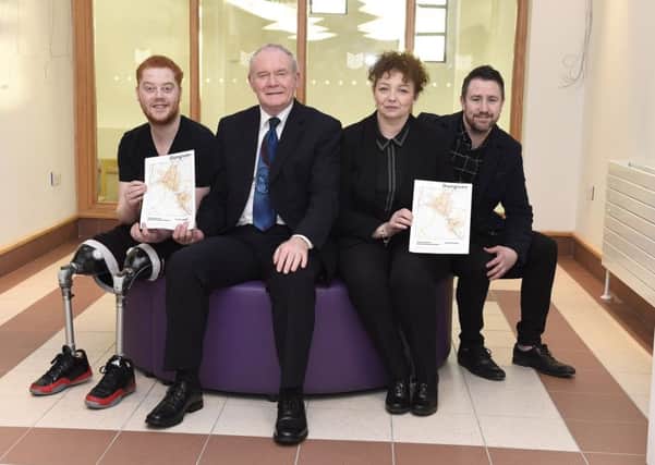 Sports Minister CarÃ¡l Ni Chuilin and deputy First Minister Martin McGuinness with Ryan O'Connor and Dungiven boxer Paul McCloskey. Picture: Michael Cooper