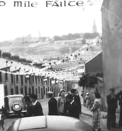 Crowds begin to gather along the Lone Moor Road to await the arrival of Eamon de Valera when he paid a visit to Derry in 1951.