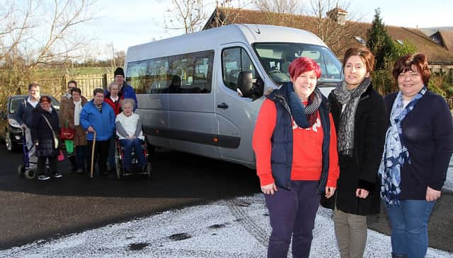 Glenshane Care were delighted to receive their new minibus on Monday, Day Care workers Corinna Martin, Margaret O'Connor and Annemarie Convery are pictured with a few of the first people who got the chance to take a journey on the bus. INLV0816-074KDR