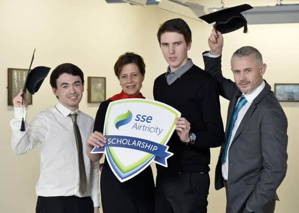 Pictured with Vicky Boden from SSE Airtricity are Derry students Andrew Martin, Ryan Doherty and Connor Olphert.